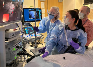 Dr. Shami and Dr. Henry look at screen during endoscopic ultrasound