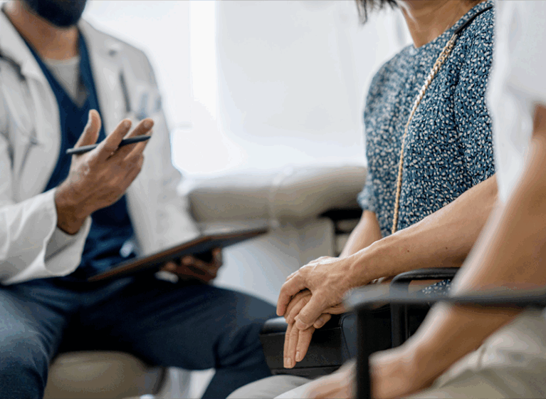 a provider talks with a couple