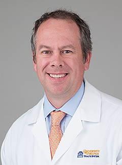 Dr. Michael McCulloch in a white coat